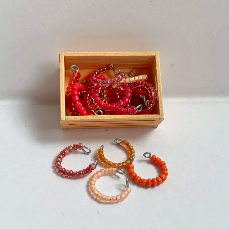 Pack of single LPS necklaces in shades of red