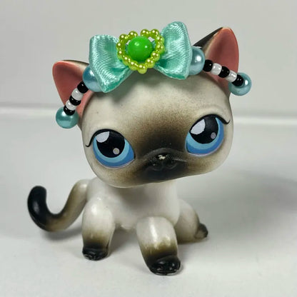 Blue, black, white, and green LPS crown
