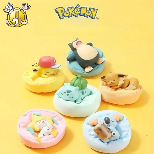 Figurine Pokémon endormi avec coussin